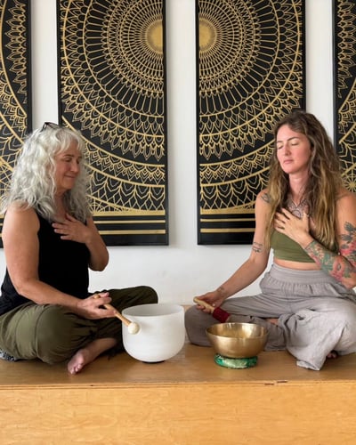 Flow Yoga Georgetown sound healing training with singing bowls in Austin Texas